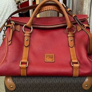 Dooney Florentine deep red bag. The best way to go places!
